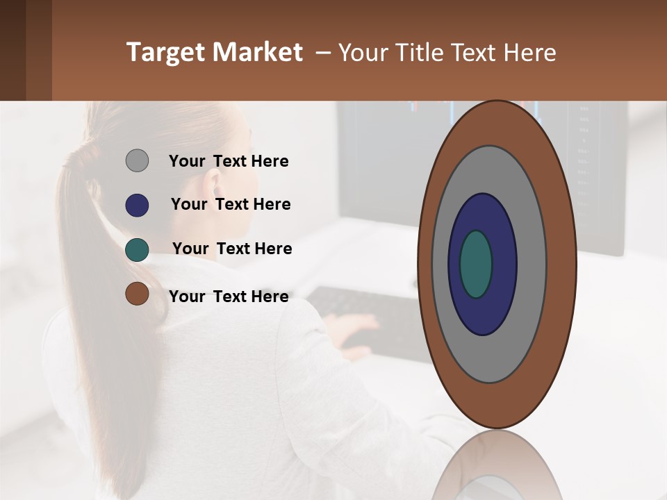 A Woman Sitting At A Desk With A Computer PowerPoint Template