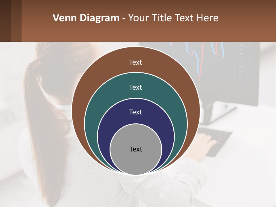 A Woman Sitting At A Desk With A Computer PowerPoint Template