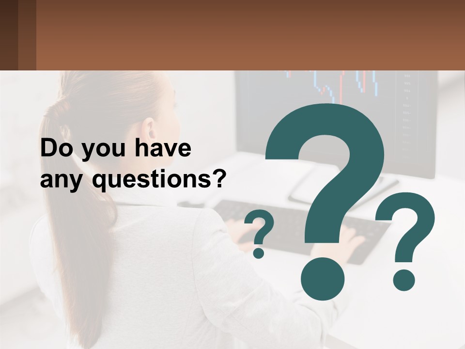 A Woman Sitting At A Desk With A Computer PowerPoint Template