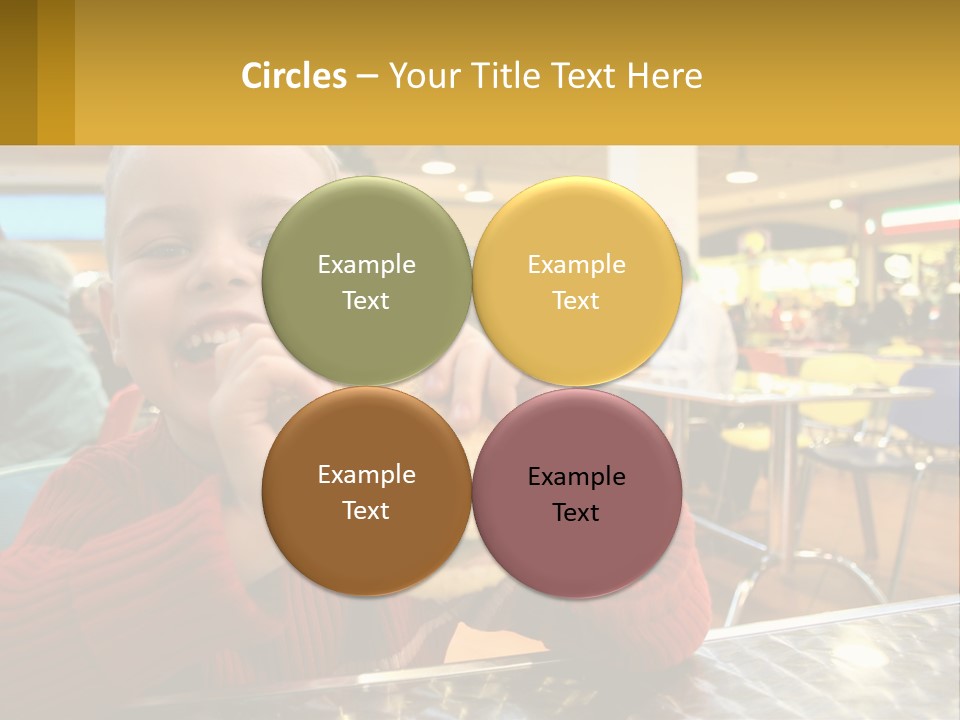 A Young Boy Eating A Sandwich In A Restaurant PowerPoint Template