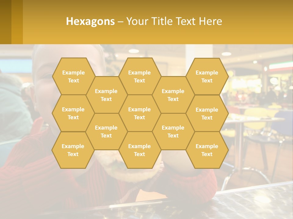 A Young Boy Eating A Sandwich In A Restaurant PowerPoint Template