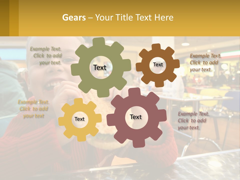 A Young Boy Eating A Sandwich In A Restaurant PowerPoint Template