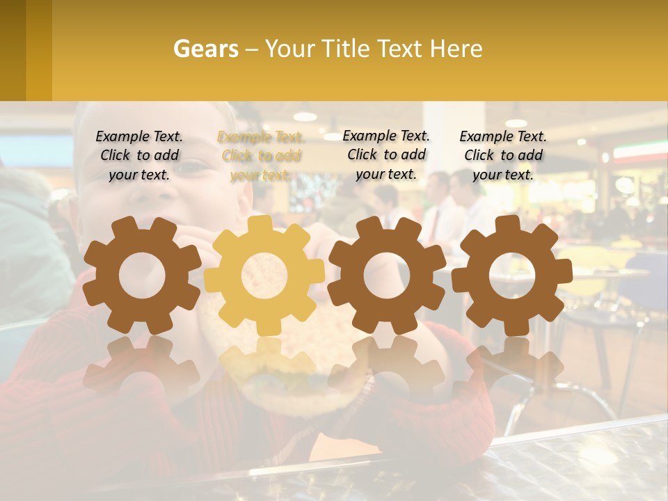 A Young Boy Eating A Sandwich In A Restaurant PowerPoint Template