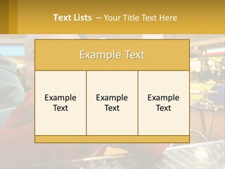 A Young Boy Eating A Sandwich In A Restaurant PowerPoint Template