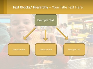 A Young Boy Eating A Sandwich In A Restaurant PowerPoint Template