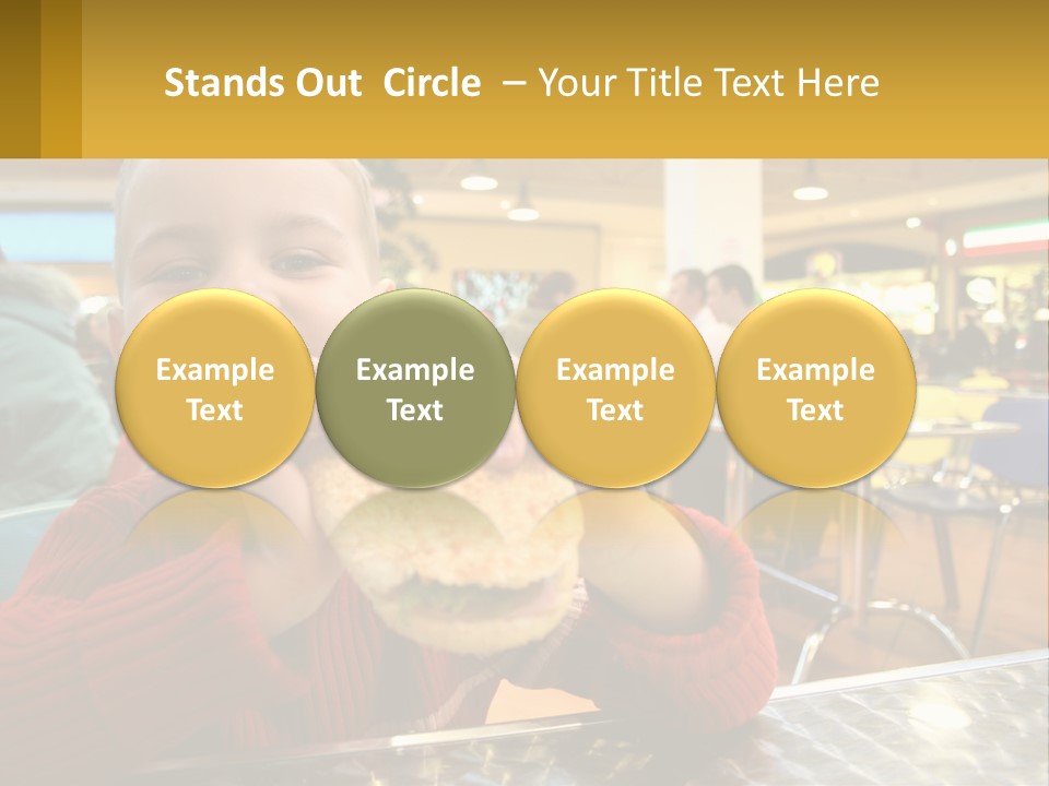 A Young Boy Eating A Sandwich In A Restaurant PowerPoint Template