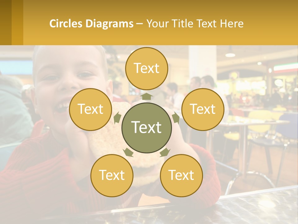 A Young Boy Eating A Sandwich In A Restaurant PowerPoint Template