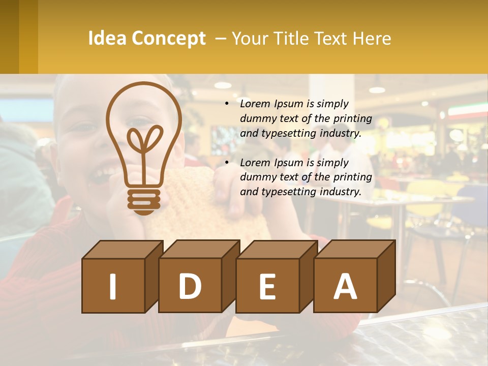 A Young Boy Eating A Sandwich In A Restaurant PowerPoint Template