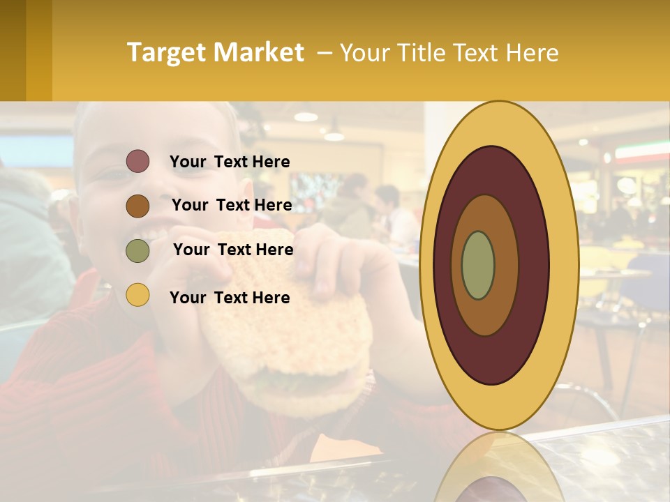 A Young Boy Eating A Sandwich In A Restaurant PowerPoint Template