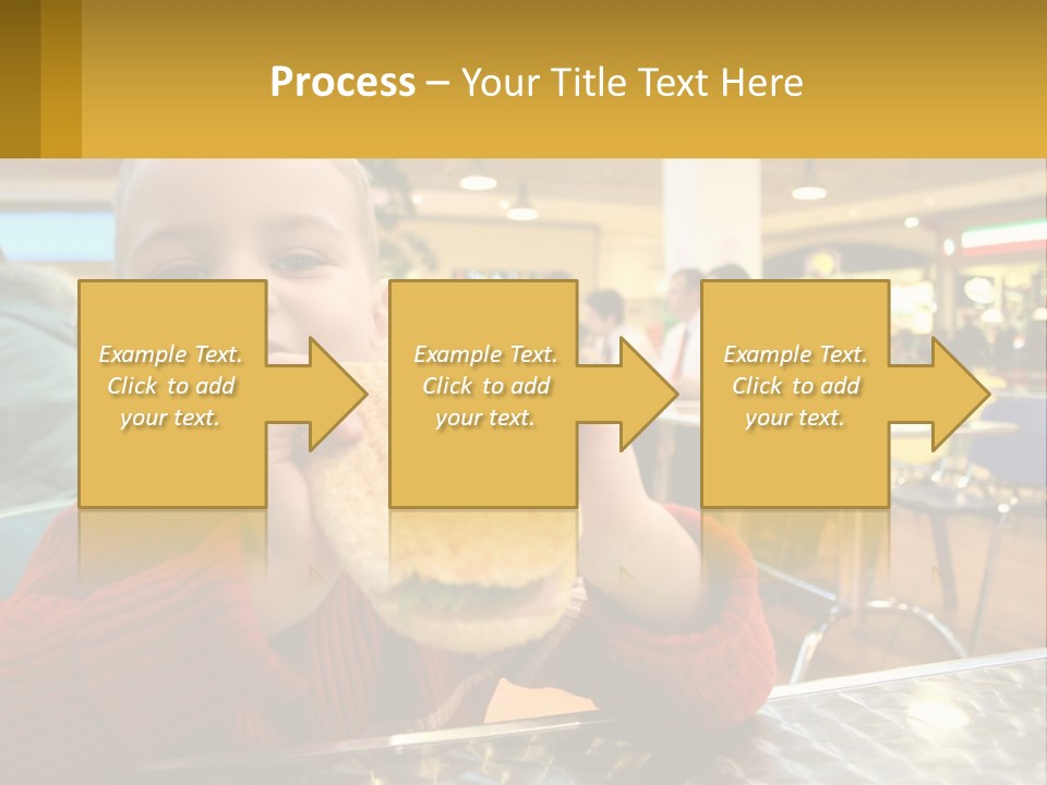 A Young Boy Eating A Sandwich In A Restaurant PowerPoint Template