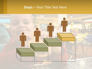 A Young Boy Eating A Sandwich In A Restaurant PowerPoint Template