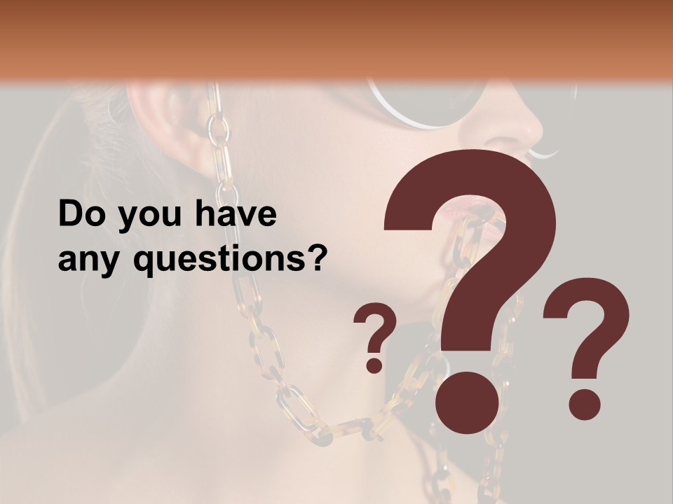 A Woman Wearing Sunglasses With A Chain Around Her Neck PowerPoint Template