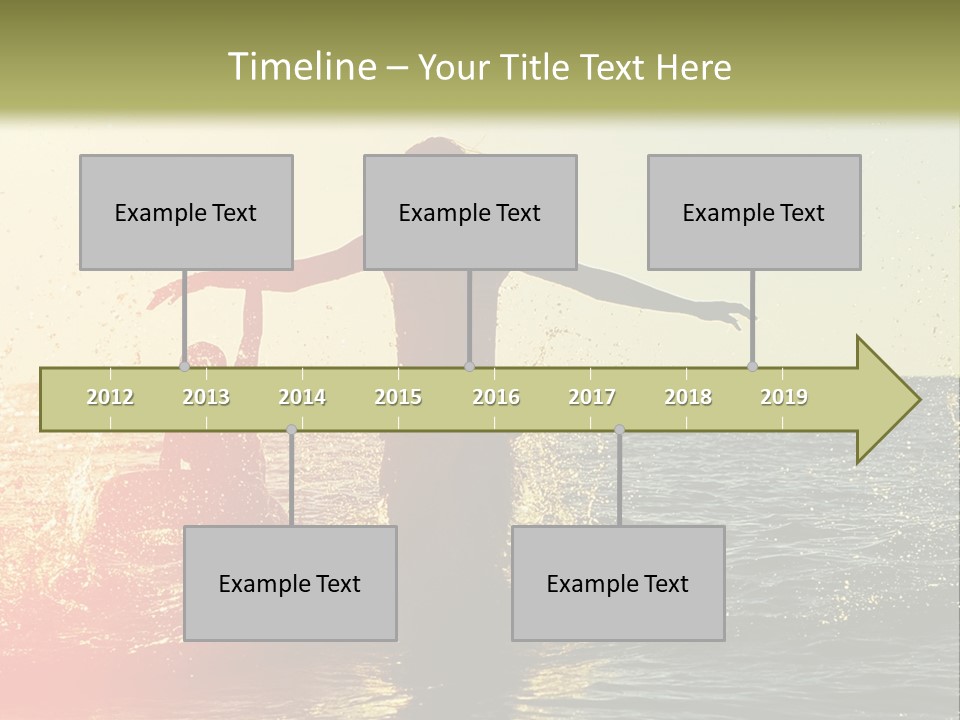 A Group Of People Playing In The Water At Sunset PowerPoint Template