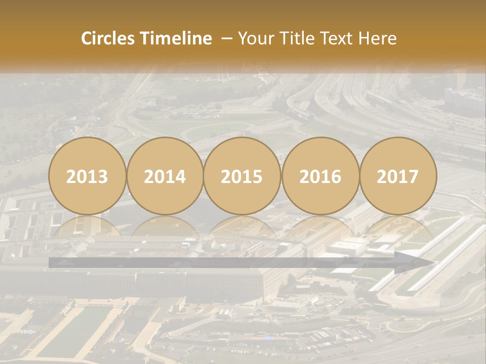 An Aerial View Of A Large Building In A City PowerPoint Template