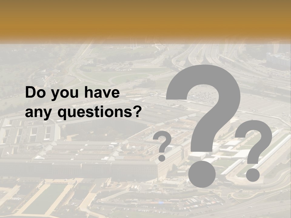 An Aerial View Of A Large Building In A City PowerPoint Template