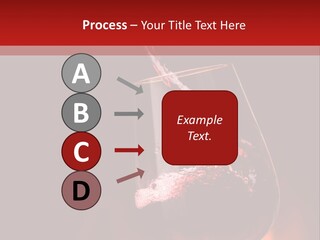 A Red Wine Being Poured Into A Wine Glass PowerPoint Template