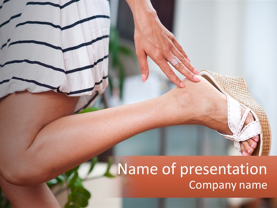 A Woman's Legs With A Hat On Top Of Them PowerPoint Template