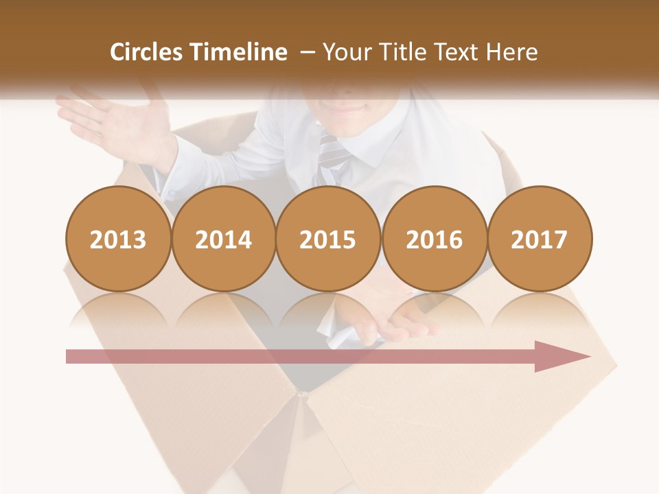 A Man Sitting In A Cardboard Box With His Hands Out PowerPoint Template