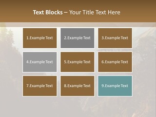 A Picture Of A Mountain Range With Trees In The Foreground PowerPoint Template