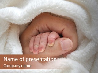 A Baby's Hand Wrapped In A Blanket PowerPoint Template