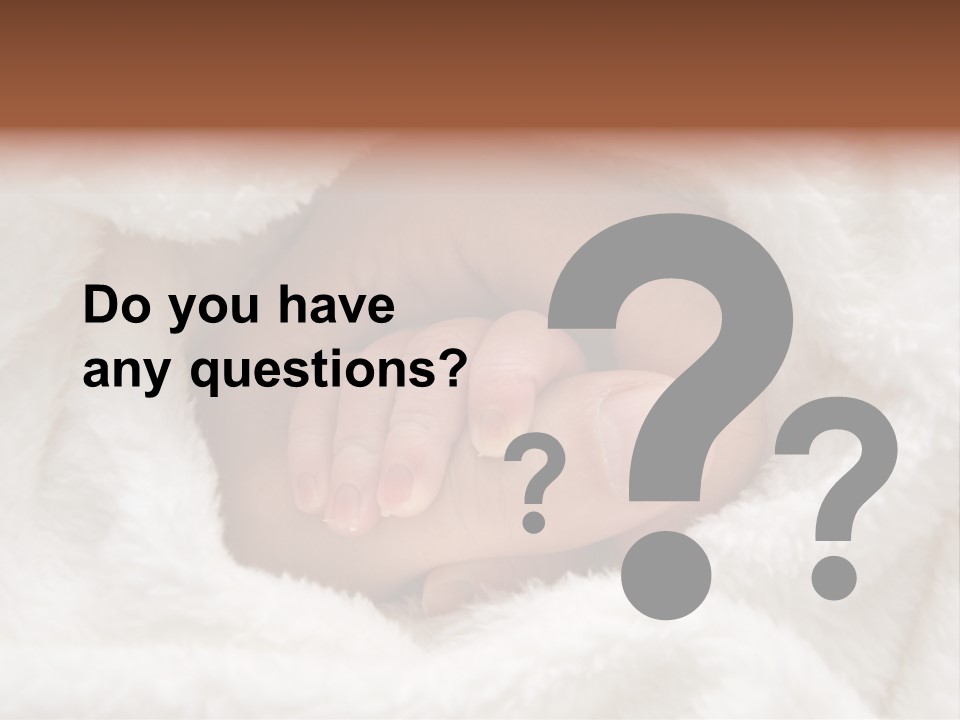 A Baby's Hand Wrapped In A Blanket PowerPoint Template