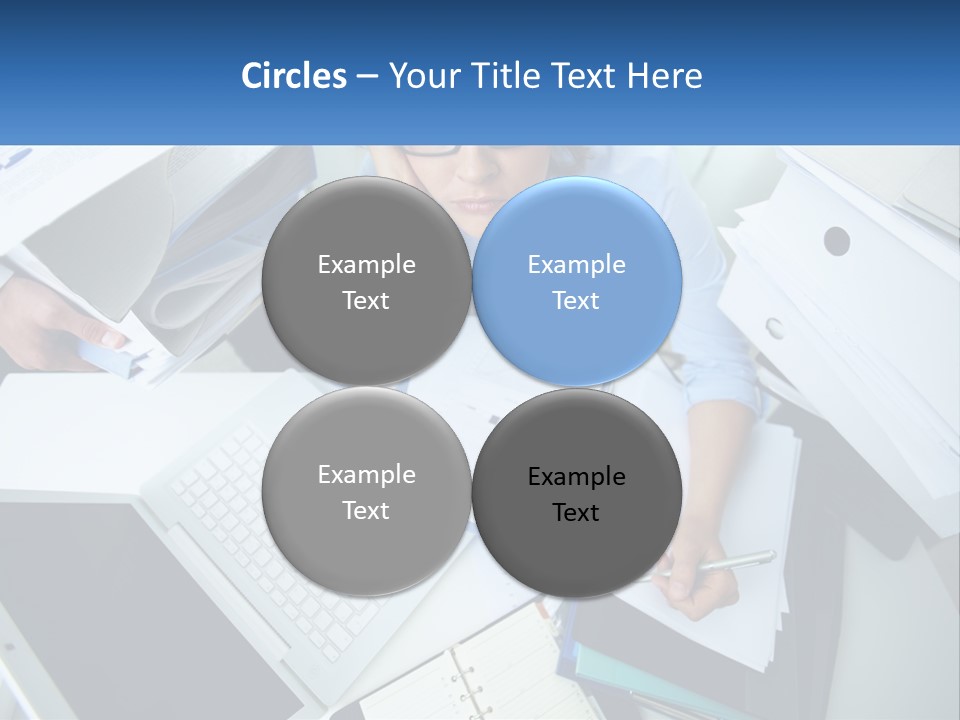 A Woman Sitting At A Desk With A Laptop And Papers PowerPoint Template