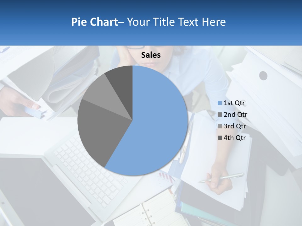 A Woman Sitting At A Desk With A Laptop And Papers PowerPoint Template