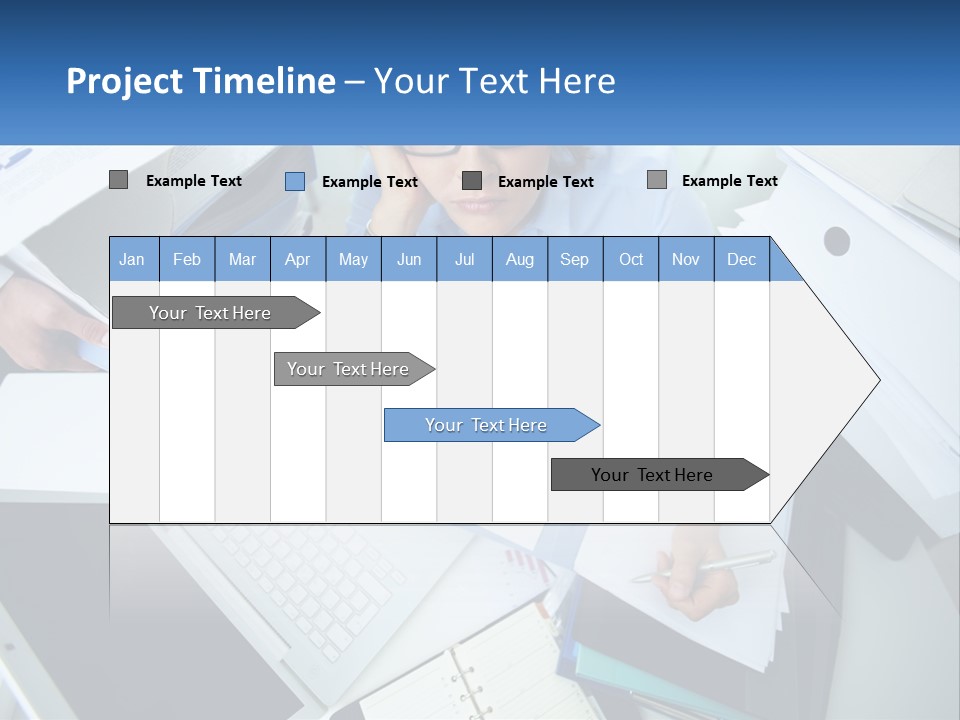 A Woman Sitting At A Desk With A Laptop And Papers PowerPoint Template