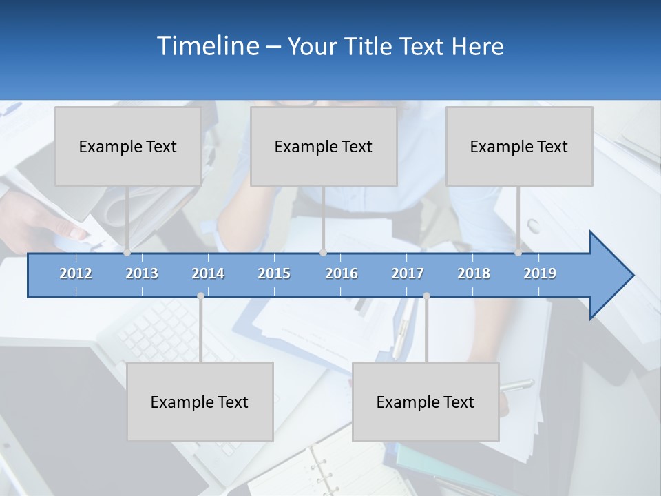 A Woman Sitting At A Desk With A Laptop And Papers PowerPoint Template