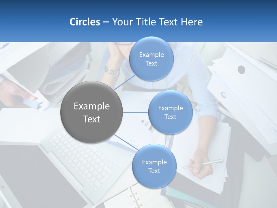 A Woman Sitting At A Desk With A Laptop And Papers PowerPoint Template