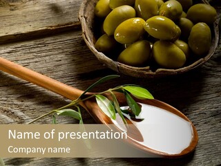 A Bowl Of Green Olives And A Spoon Of Yogurt Powerpoint Template PowerPoint Template