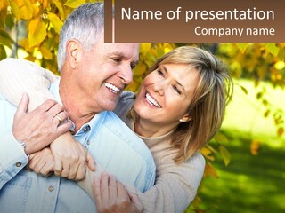 A Man And A Woman Are Smiling For The Camera PowerPoint Template
