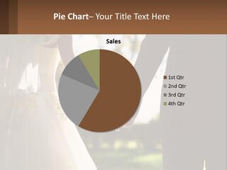 A Bride And Groom Holding Hands In A Park PowerPoint Template
