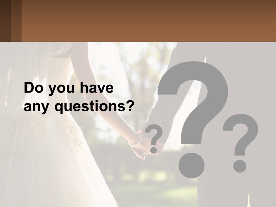 A Bride And Groom Holding Hands In A Park PowerPoint Template