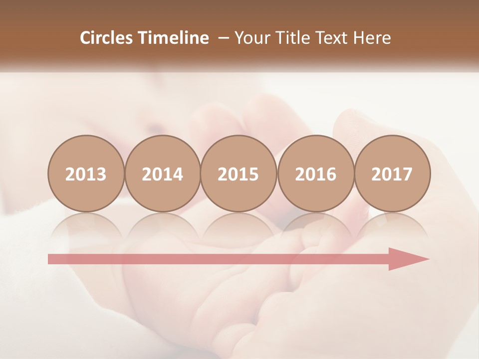 A Person Holding A Baby In Their Hands PowerPoint Template