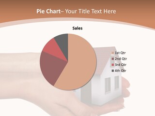 A Person Holding A Small House In Their Hand PowerPoint Template