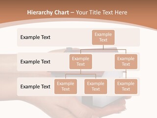 A Person Holding A Small House In Their Hand PowerPoint Template