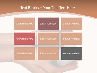 A Person Holding A Small House In Their Hand PowerPoint Template