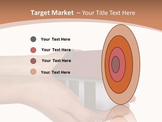 A Person Holding A Small House In Their Hand PowerPoint Template