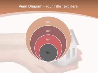 A Person Holding A Small House In Their Hand PowerPoint Template