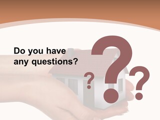 A Person Holding A Small House In Their Hand PowerPoint Template