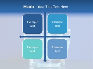 A Glass Of Blue Liquid With A Spoon In It PowerPoint Template