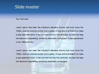 A Glass Of Blue Liquid With A Spoon In It PowerPoint Template
