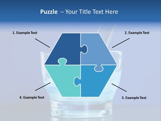 A Glass Of Blue Liquid With A Spoon In It PowerPoint Template