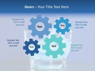 A Glass Of Blue Liquid With A Spoon In It PowerPoint Template