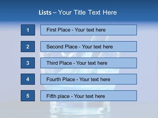 A Glass Of Blue Liquid With A Spoon In It PowerPoint Template