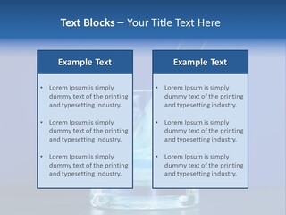 A Glass Of Blue Liquid With A Spoon In It PowerPoint Template