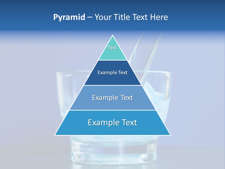 A Glass Of Blue Liquid With A Spoon In It PowerPoint Template