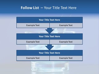 A Glass Of Blue Liquid With A Spoon In It PowerPoint Template