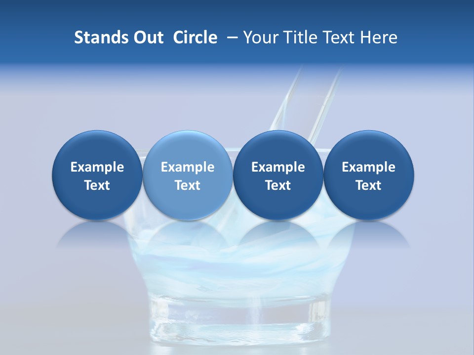 A Glass Of Blue Liquid With A Spoon In It PowerPoint Template
